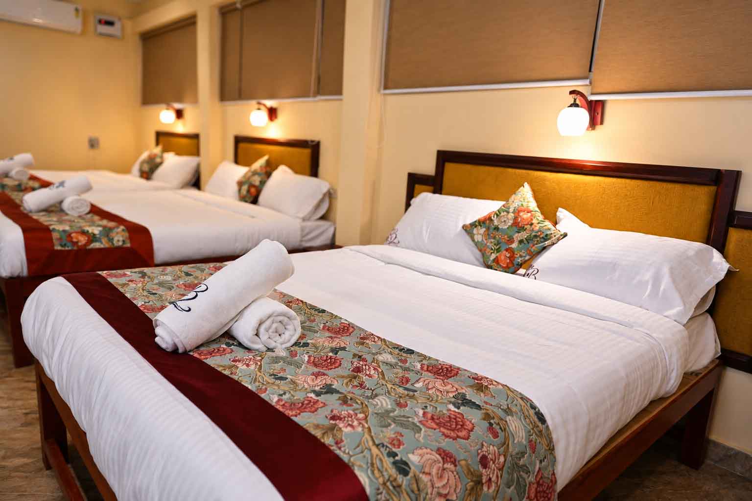 Deluxe Three Double Bed Suite